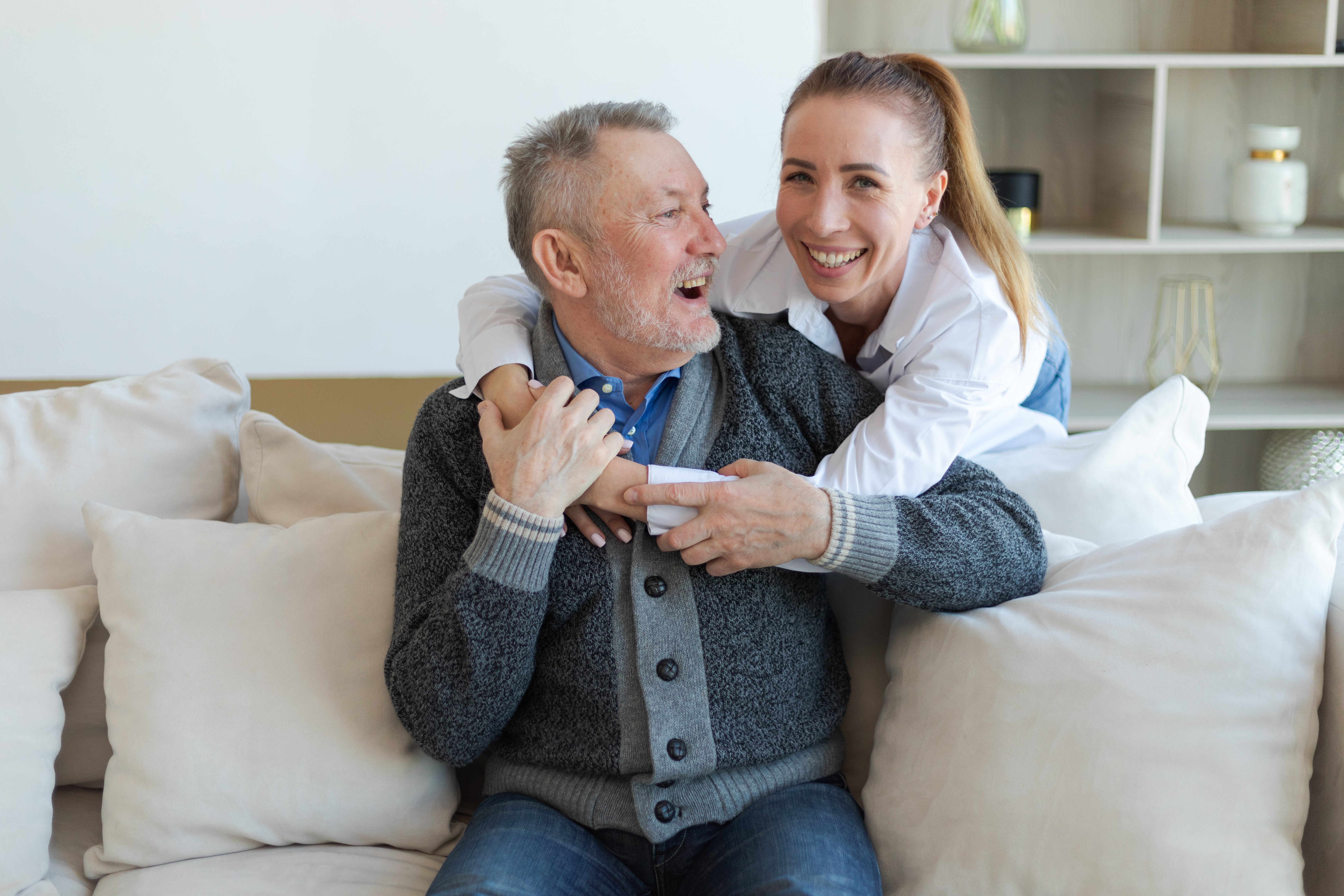 Family embracing at home